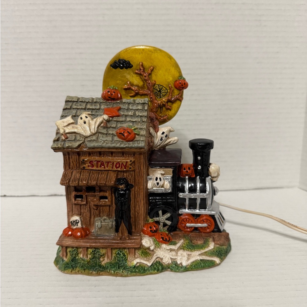 Haunted Train Station with Ghosts and Pumpkins